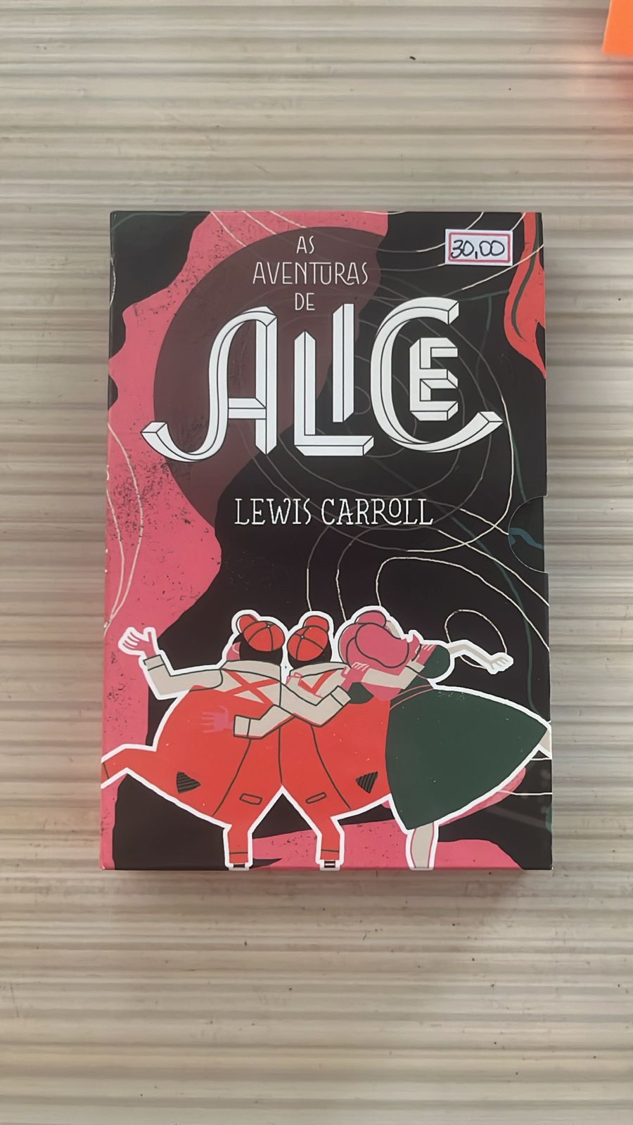 Capa do livro As Aventuras de Alice, de Lewis Carroll