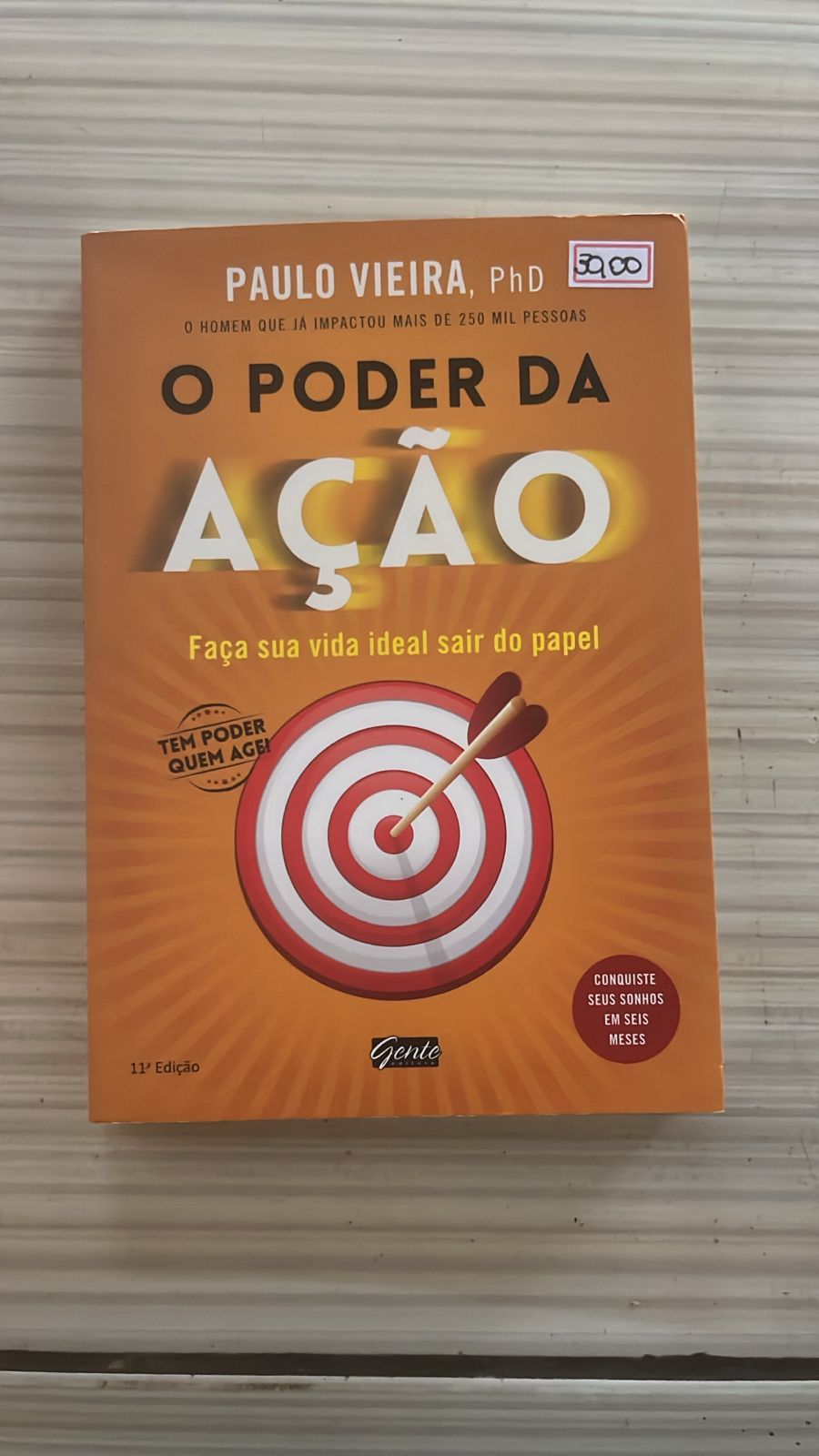 Capa do livro O Poder da Ação, de Paulo Vieira, 11ª edição, sobre fazer a vida ideal sair do papel e conquistar sonhos em seis meses